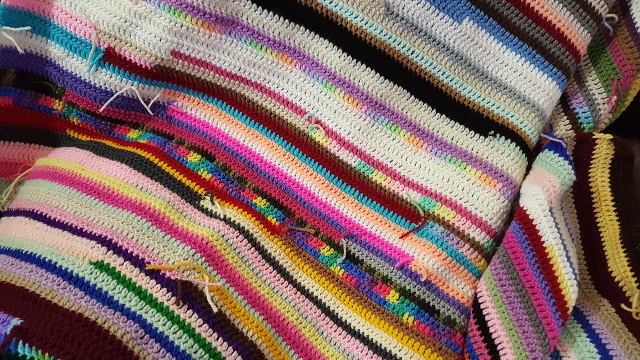 How to Make a Crochet Scrap Yarn Blanket — still from the Poochie Baby video tutorial